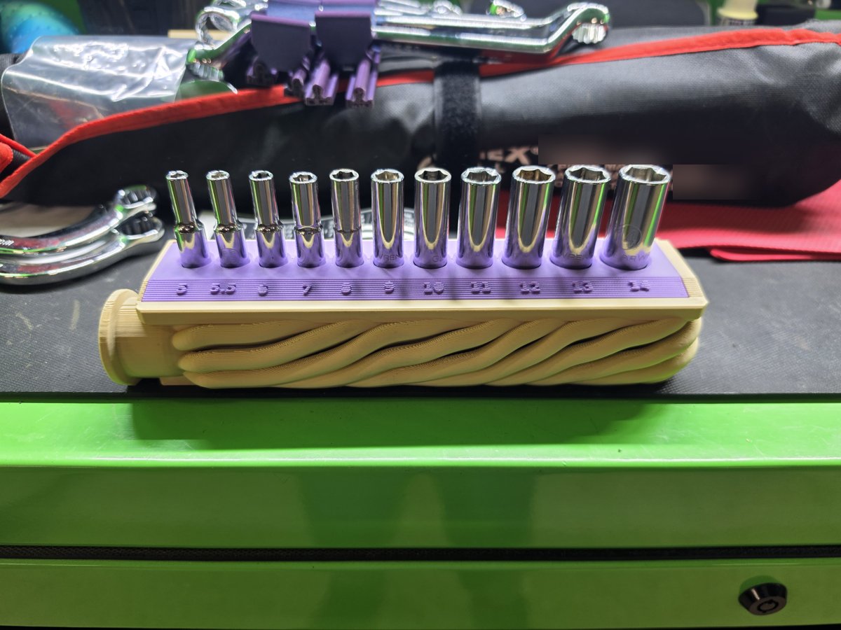 Exhaust manifold styled 1/4 inch socket holder from the front, with ICON metric sockets 5-14mm in labeled slots